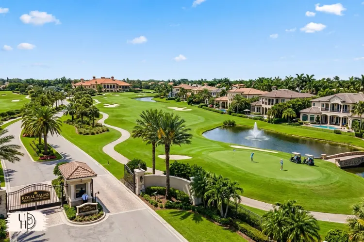 luxury golf course gated community in Florida, country club estates, green fairways, upscale homes.